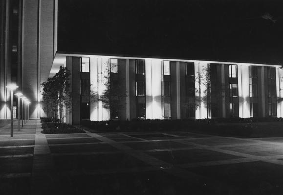 A photo of a low-rise dormitory in the Kirwan-Blanding Complex at night