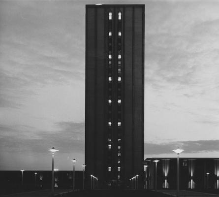 An evening view of one of the towers and of the low-rise of the Kirwan-Blanding Complex