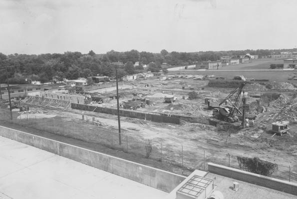 Construction of Haggin Hall, seen from Donovan Hall. Fraternity Row in the background. Haggin Hall was named after James B. Haggin and dedicated on September 16, 1960. Received July 31, 1959 from Public Relations