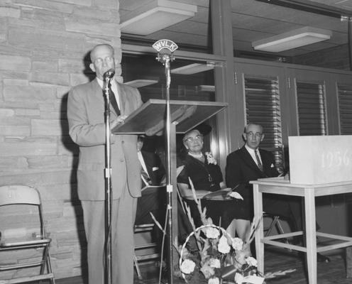 Dean Sarah Bennett Holmes (second from right), Dr. William V. Gardner of First Presbyterian Church (far right) and President Frank Dickey (third from right) are listening to Frank Peterson speaking at the dedication of Holmes Hall on May 25, 1958. Received May 25, 1958 from Public Relations