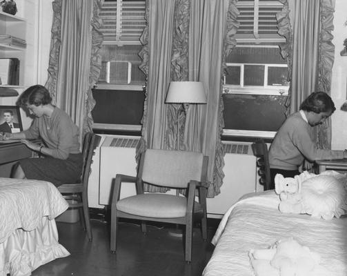 Two unidentified women are in their dorm room in Holmes Hall. Photographer: University of Kentucky