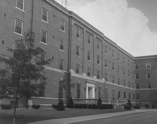 The front of Keeneland Hall, a woman's dormitory. Keeneland Hall was named after the Keeneland Foundation which donated $200,000 and on October 17, 1955, it was dedicated to the foundation. Received August 22, 1957 from Public Relations