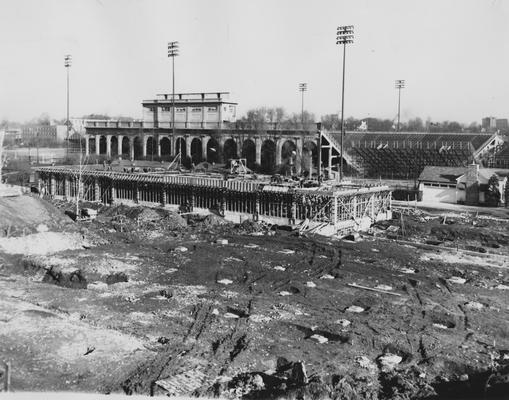 Construction of the Fine Arts Buildingand a view of the McLean Stadium and Stoll football field. Photographer: W. E. Sutherland