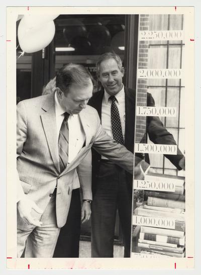 President Charles Wethington (left) and Athletic Director C. M. Newton (right) during the Library Campaign
