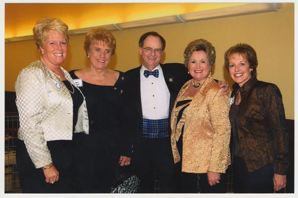 From the left:  Mariam Sims, Alice Sparks, President Lee Todd, Patsy Todd, and Marianne Smith Edge.  They are at a ceremony for the reopening of the Main Building