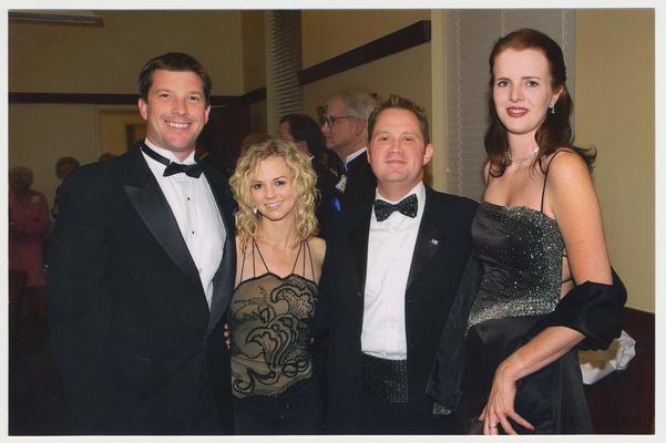 From the left:  Kathryn Todd's unidentified escort; Kathryn Todd, daughter of Patsy and Lee Todd; Troy Todd, son of Patsy and Lee Todd; and Alicia DeGroot, Troy's escort.  They are at a ceremony for the reopening of the Main Building