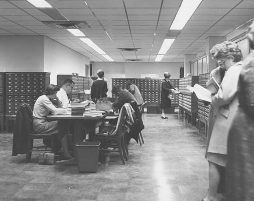 Students studying in King Library Annex, Reference Room on the first floor. Received September 13, 1966 from Public Relations