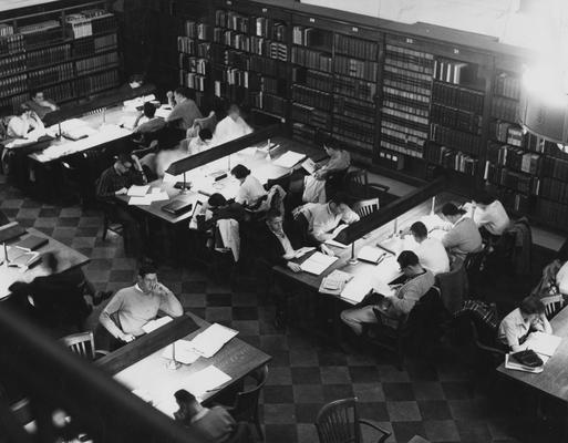 Students studying in the Breckinridge Room of King Library (overhead view)