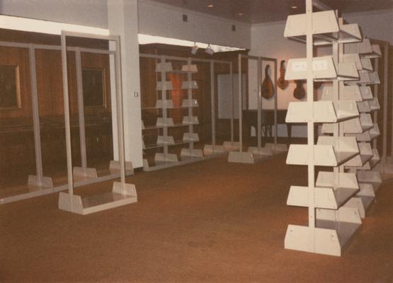 A color photo of shelving being put up in the Peal Gallery in the Margaret I. King North Library. Mr. Peal is one of the first to give books to the University of Kentucky. Photographer: Terry Warth