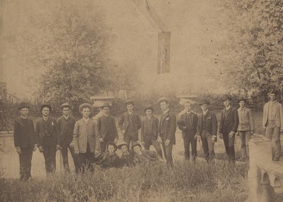 Group of male students in 1886 or 1887; photo probably taken in the yard of Maxwell Place. Some of the names listed are: (fourth) Jesse Mills, (sixth) Keene R. Forston, (ninth) James Guthrie Herr, (thirteenth) J. Tandy Ellis