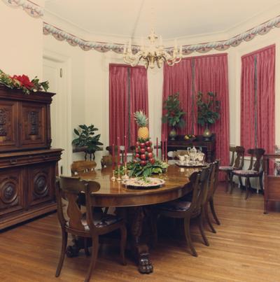The dinning room table inside Maxwell Place, decorated for Christmas, while President Roselle was the resident