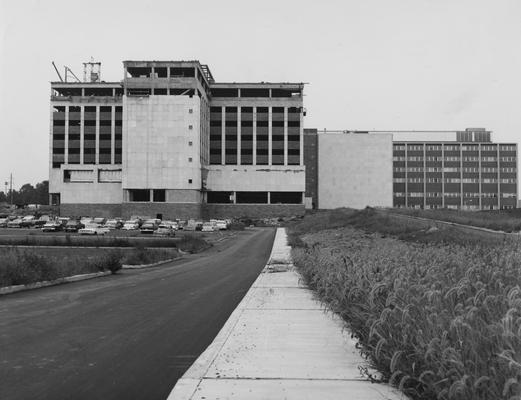 Cars parked in front of Medical Center construction site. Received August 13, 1960 from Public Relations