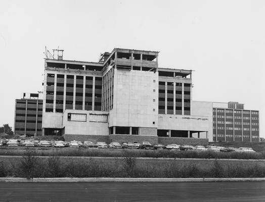 Cars parked in front of Medical Center construction site. Received August of 1960 from Public Relations