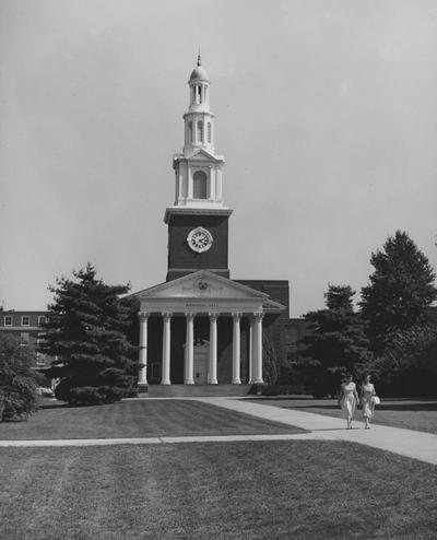 Two women walking away from Memorial Hall. Photo received from Professor Victor Portman, Kentucky Press Associates in June of 1966. Photograph is property of the Department of Public Relations in Frankfort, Kentucky