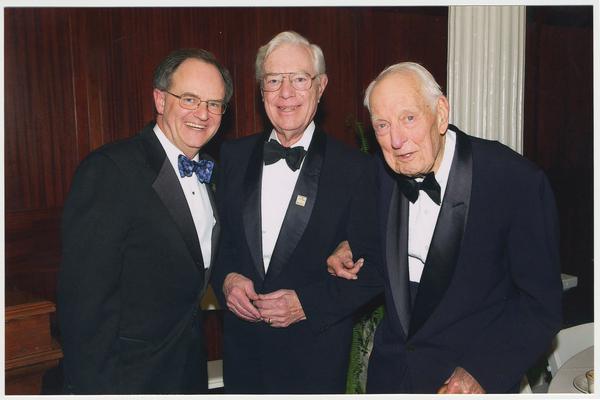 From the left:  President Lee Todd, former President Dickey, and Dr. Thomas Clark.  They are at a ceremony for the reopening of the Main Building