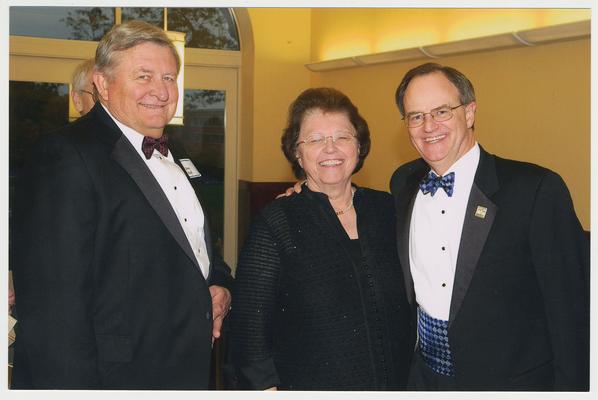 From the left:  Don Ball, Mira Ball (Board of Trustees), and President Lee Todd.  They are at a ceremony for the reopening of the Main Building