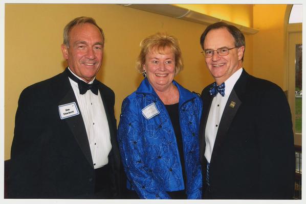 From the left:  Jim Stuckert, Diane Stuckert, and President Lee Todd.  They are at a ceremony for the reopening of the Main Building