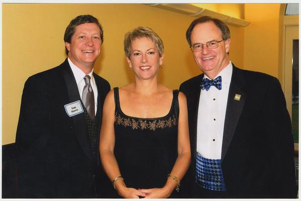 From the left:  Tom Harris, Kay Harris, and President Lee Todd.  They are at a ceremony for the reopening of the Main Building