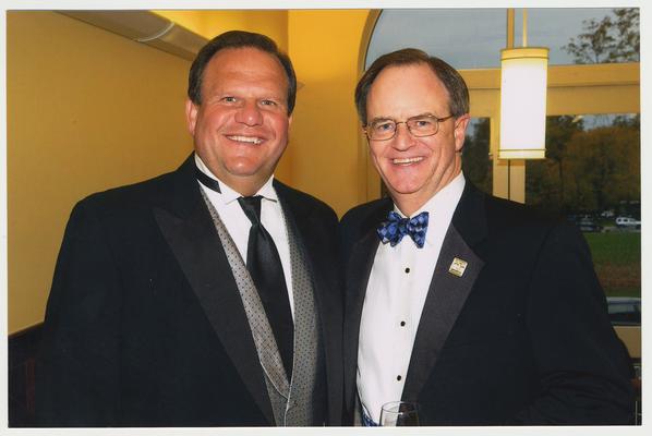 Board of Trustees member Stephen P. Branscum and President Lee Todd are at a ceremony for the reopening of the Main Building