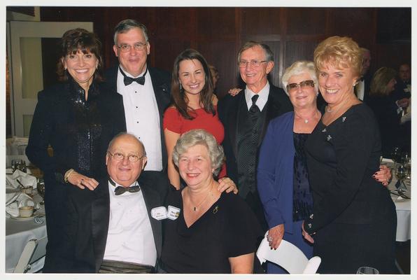 From the left, standing:  Barbara Smith Young (Board of Trustees), Russ Williams (Board of Trustees staff representative), Rachel Watts (student representative), Billy Joe Miles (Board of Trustees Chair), Joetta Wickliffe (Board of Trustees ), and Alice Sparks (Board of Trustees.)  From the left, sitting:  Billy B. Wilcoxson (Board of Trustees) and Myra Tobin (Board of Trustees).  They are at a ceremony for the reopening of the Main Building