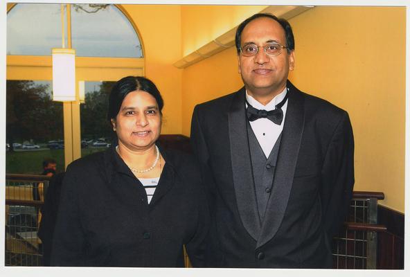 NaLini Sudharshan and Deranathan Sudharshan are at a ceremony for the reopening of the Main Building