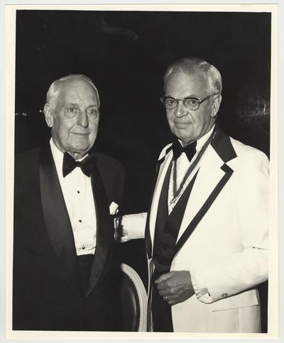Dr. Thomas D. Clark (left) is receiving the Sons of American Revolution Citizenship Medal from Professor John S. Herrick (right) from Western Kentucky University.  The award banquet was in Louisville, KY