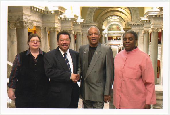 From the left:  Kathy Schiflett, Administrative Office of the Courts; Kentucky Representative Jesse Crenshaw; Cecil R. Madison, Sr. of UK Libraries; and Reinette F. Jones, UK Libraries.  The photograph was taken in the Capitol