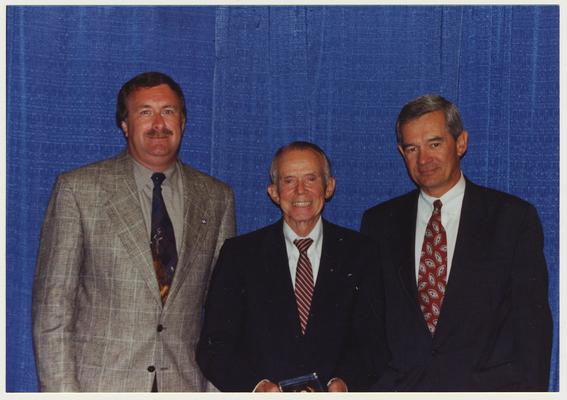 The 1994 Alumni Association Service Awards.  From the left:  Michael A. Burleson, Thomas W. Harris, and Joseph Burch