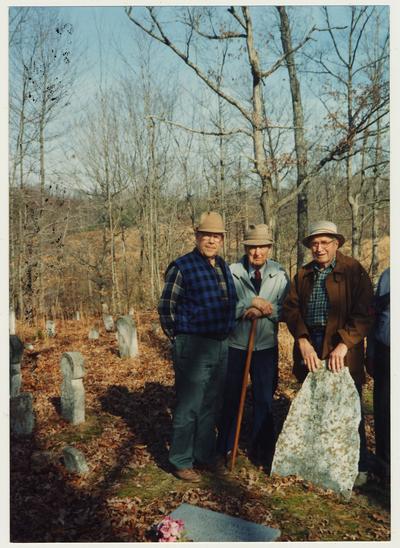 From the left:  Dennie Campbell, Dr. Thomas D. Clark, and Jess Wilson at a grave site