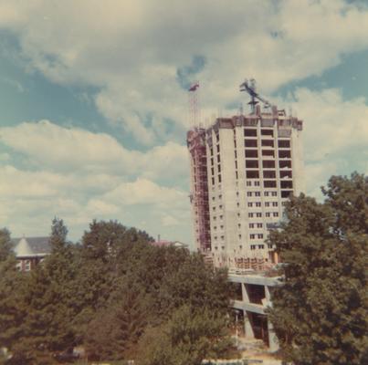 A color photo of the construction of White Hall Classroom Building (right) and Patterson Office Tower (next to White Hall) near Miller Hall (left). This photo was taken from the window in room 518 in King Library on September 12, 1968 and donated by Terry Warth