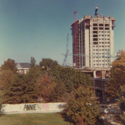 A color photo of the construction of White Hall Classroom Building (right) and Patterson Office Tower (next to White Hall) near Miller Hall (left). This photo was taken from the window in room 518 in King Library on October 16, 1968 and donated by Terry Warth