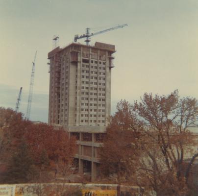 A color photo of the construction of White Hall Classroom Building (right) and Patterson Office Tower (next to White Hall). This photo was taken from the window in room 518 in King Library on November 15, 1968 and donated by Terry Warth