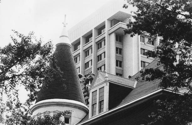 A picture of the top of Patterson Office Tower and the top of Gillis Building