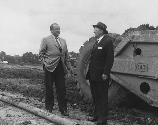 Dr. Peterson and Mr. Farris at new athletic center site. Received September 18, 1958 from Public Relations