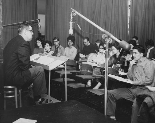 Students listen to the teacher in the WBKY-104 class