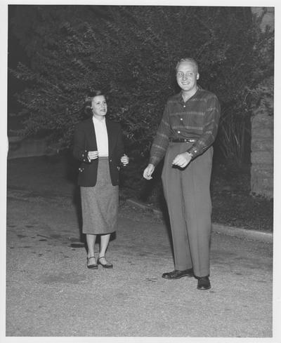 Margaret Futrell (left) and Dick Vimont (right) are talking outside