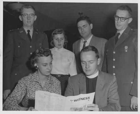 Reverend Robert Estill and 5 others reading 