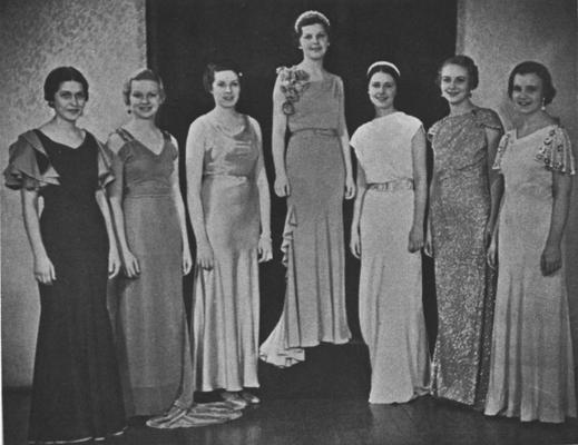 Queen and her court from 1934 Kentuckian: Edna Evans (Class of 1935), Betsy Frye, Scovell Bryant, Ruby Dunn, Marian Conner Dawson - Queen (Class of 1935), Elizabeth Jones (Class of 1935), Bethe Bosworth (Class of 1937); This image is in the 1934 Kentuckian on page 124; This image is in the 1965, May 9 Herald - Leader; Photographer: Lexington Herald - Leader