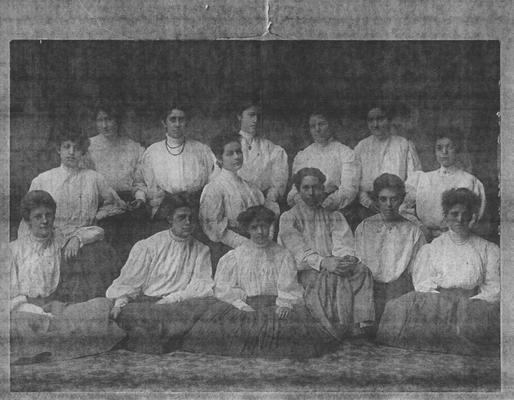 Early picture of the members of Chi Epsilon Chi; Row 1 (from left to right): Aubyn Chinn, Mary Rodes, and Viola Lewis; Row 2 (left to right): Lucy Hutchcraft and Mary Scrugham; Row 3 (left to right): Katherine Hopson, Martha Blessing, Ella Buckner, Louise Rodes, Anna Crenshaw, Sunshine Sweeney, Margaret Webster; This photo appeared in the 1906 Kentuckian pn page 194, picture 1
