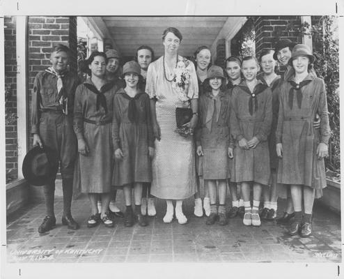 Eleanor Roosevelt at Maxwell Place with a group of Girl Scouts and a Boy Scout