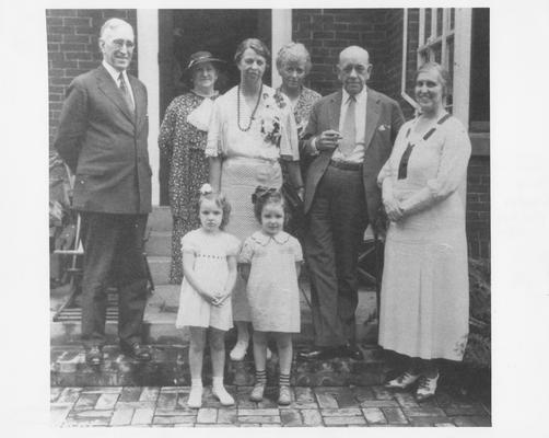 Eleanor Roosevelt visits Maxwell Place; Left to right are: President McVey, Mrs. Ruby Laffoon?, McVey's granddaughter?, Roosevelt, McVey's granddaughter?, Nancy Cook (Democratic party leader), Governor Ruby Laffoon, and Mrs. Frances Jewell McVey