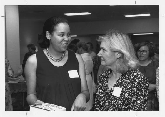 Alicia Helm (left) and Joyce Logan (right) at Woman's Club reception for faculty wives and staff; Photographer: Ken Goad