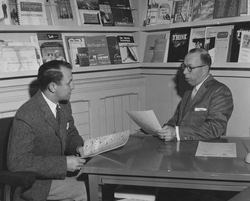 J. H. Barris, personnel manager for Shell Oil Co., Indianapolis, Indiana sits with a job candidate