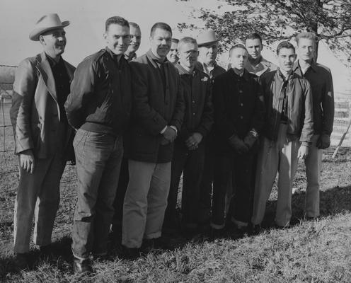 From left to right: Coach Robert W. Hicks, William Glenn Luce, Robert Bennett, Gene Cravens, Oliver Deaton, Bill Cisney, Russell Bingham, Robert Berry, Bob Garrigus, Charles Gray, and Bob Wade