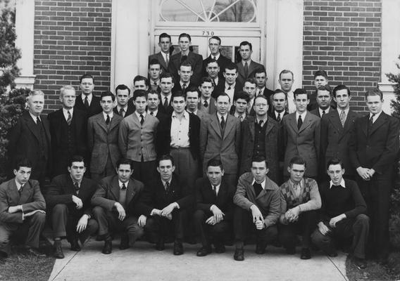 Dairy Club; From left to right, Row 1: Kelly, Price, Kells, Russell, Brown, Browder, Ison, Goodpaster; Row 2: Professor F. Ely, Professor Barkman, Cowgill, Thompson, Stamper, Professor Morrison, Beers, Clore, Petters, Hardesty; Row 3: Hill, Carpenter, Hixon, Campbell, Barnett, Porter, Stapleton; Row 4: Hensley, Routen, Lewis, Colemann, Piper, Cobb; Row 5: Bryan, Phillips, Brandon, Marker, Wright; Row 6: Click, Reynolds, Colliver, Farris; This photo is in the 1941 Kentuckian on page 73
