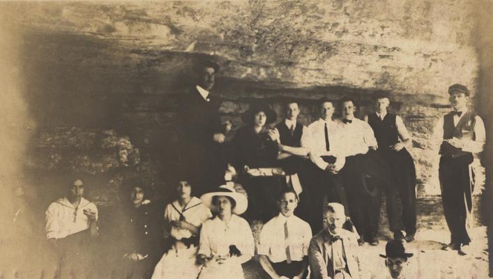 A party at the mouth of a cave while on an excursion to High Bridge