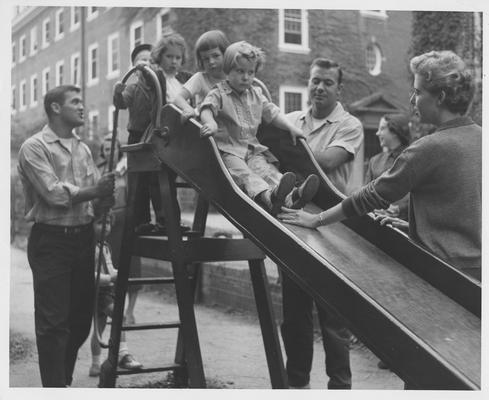 Early childhood class at the playground on the University of Kentucky campus; Student teachers practice their skills on these pre - school students