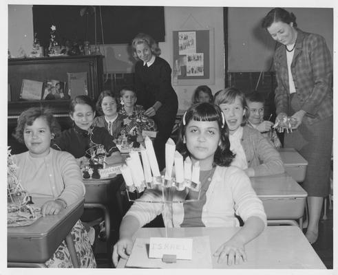 A fifth grade class with their projects on their desks; Olive Barrett - Critic Teacher