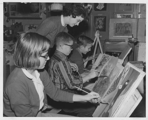 Junior High students painting in an art class