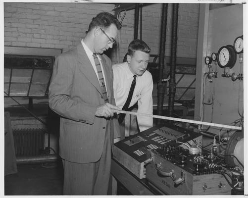 Dr. Merd Baker and Charles Staley doing refrigeration research